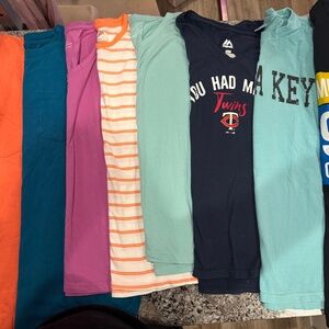 Women’s T-shirts (would all fit a larger medium/large body)
